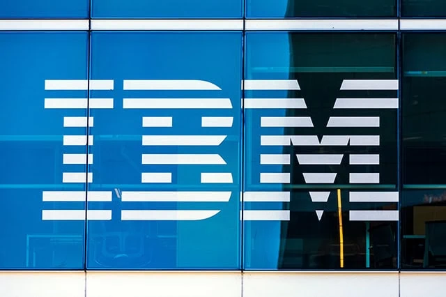 13 Best Long-Term Stocks to Buy and Hold Forever 16 IBM sign and logo on glass facade of IBM Watson modern office building in SOMA california.