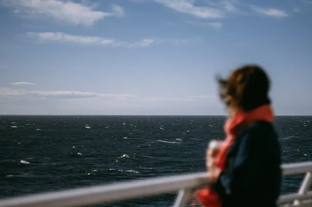 woman looking out at sea